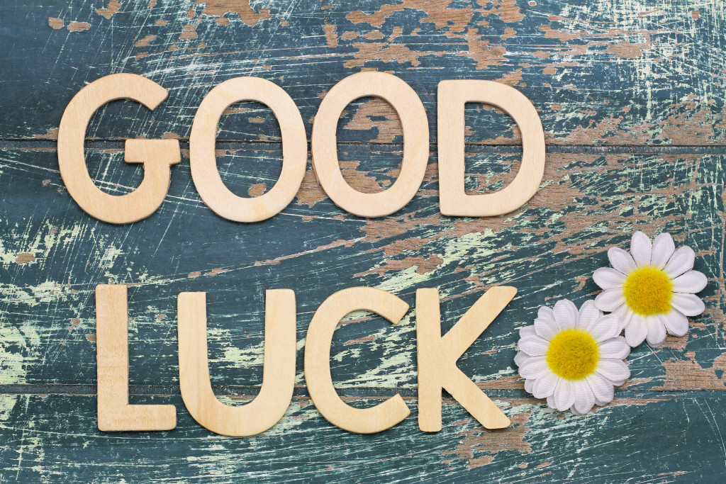 Good luck written with wooden letters on rustic wooden surface